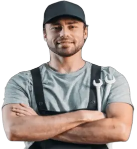 Smiling lawn mower technician in uniform holding wrench at repair service